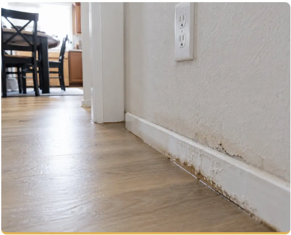 Flood Cleanup in Orange County 1 Water damage along baseboard in home, Timberline Build Co